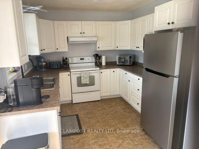 Photo 5 of 120 Cameron Street N, Timmins, TM - TNW - Algonquin to Jubilee — HOMEH