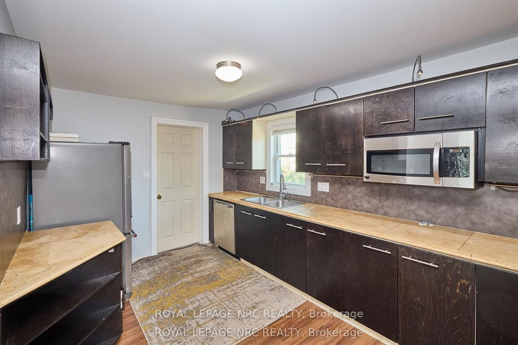 Photo 10 of 557 Geneva Street, St. Catharines, Lakeport — HOMEH