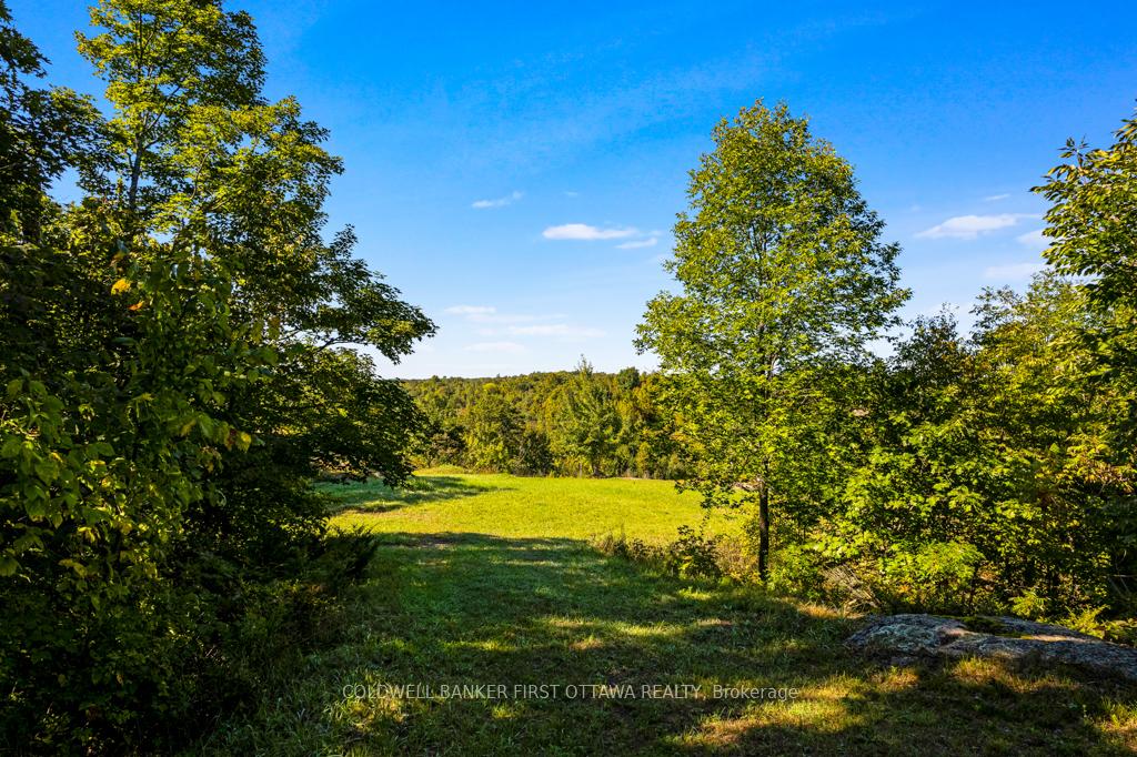 Photo 5 of 16 Grey Owl Road, Frontenac, Frontenac South — HOMEH