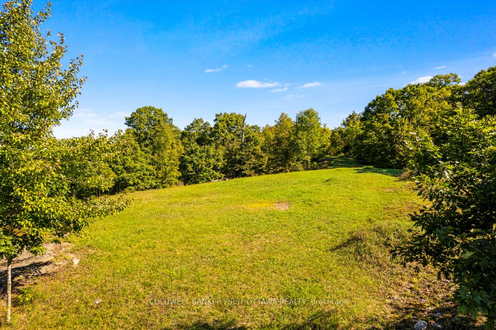 Photo 6 of 16 Grey Owl Road, Frontenac, Frontenac South — HOMEH