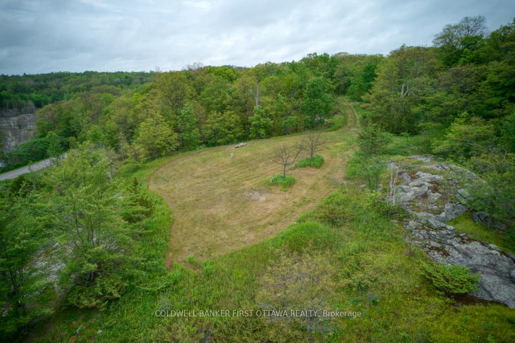 Photo 7 of 16 Grey Owl Road, Frontenac, Frontenac South — HOMEH