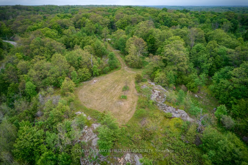 Photo 8 of 16 Grey Owl Road, Frontenac, Frontenac South — HOMEH