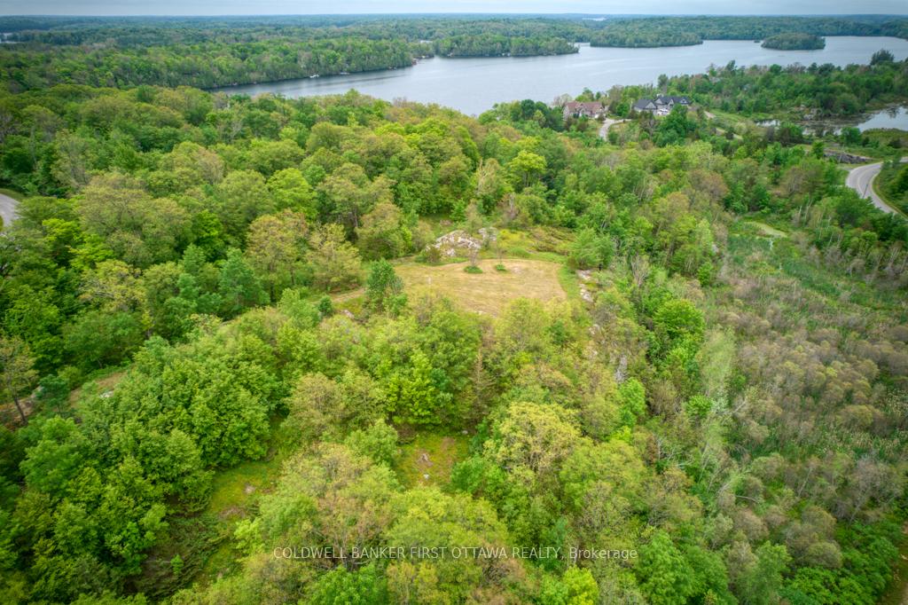 Photo 9 of 16 Grey Owl Road, Frontenac, Frontenac South — HOMEH