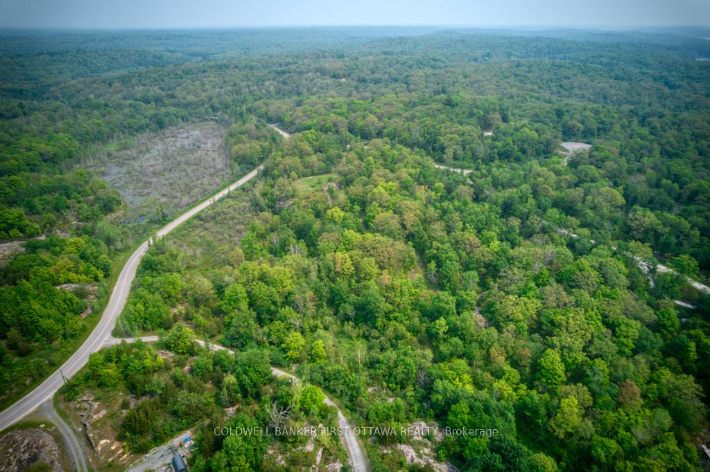 Photo 10 of 16 Grey Owl Road, Frontenac, Frontenac South — HOMEH