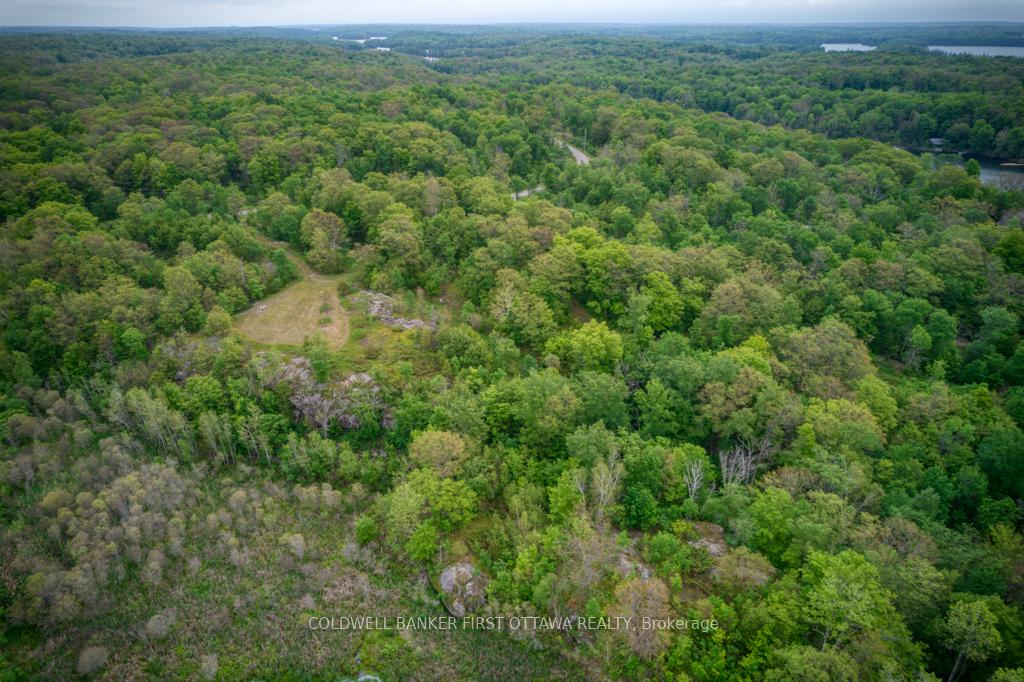 Photo 11 of 16 Grey Owl Road, Frontenac, Frontenac South — HOMEH