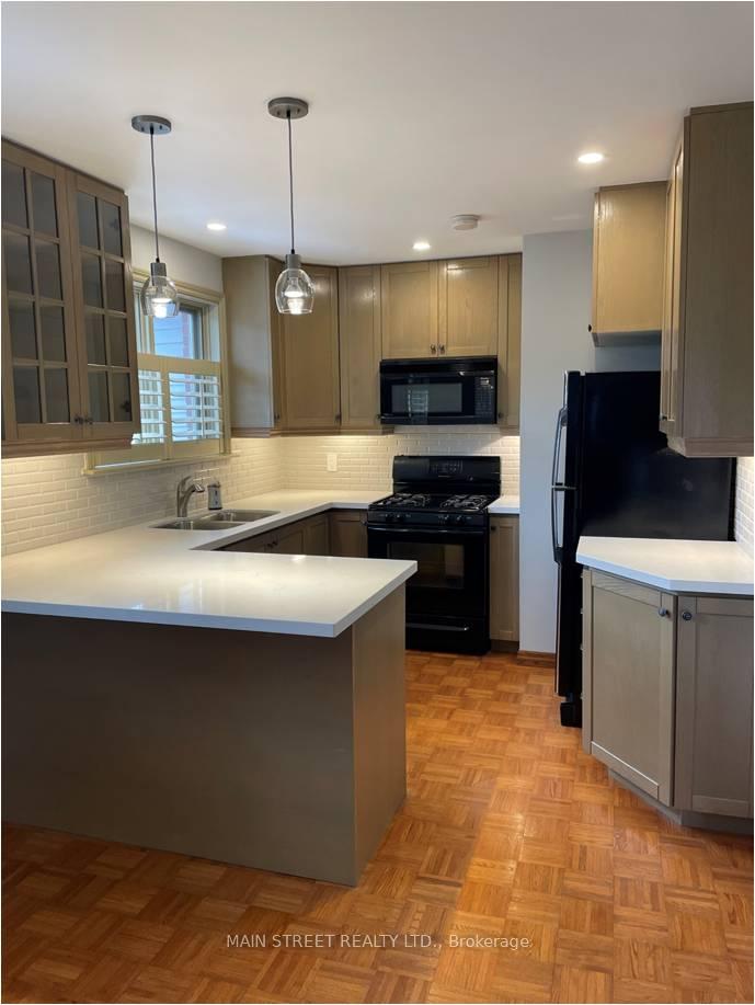 Photo 4 of Unit A, 16 Child Drive, Aurora, Aurora Highlands — HOMEH
