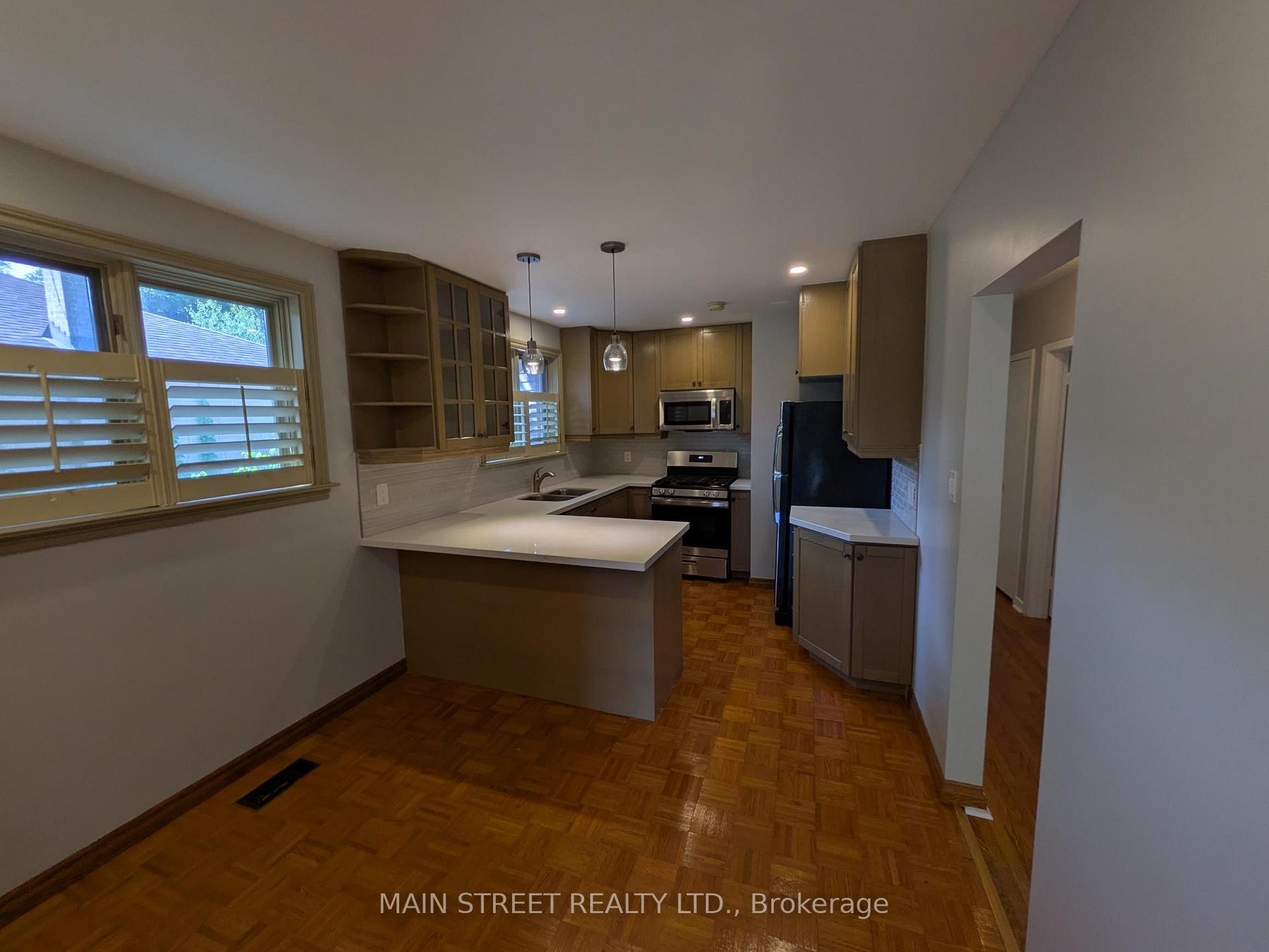 Photo 5 of Unit A, 16 Child Drive, Aurora, Aurora Highlands — HOMEH