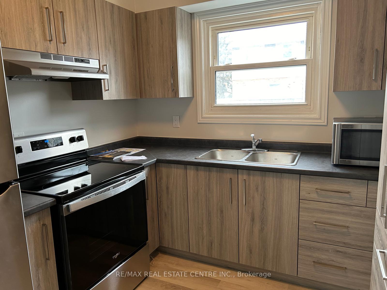 Photo 2 of Unit 3, 420 Pioneer Drive, Kitchener, Pioneer Park — HOMEH