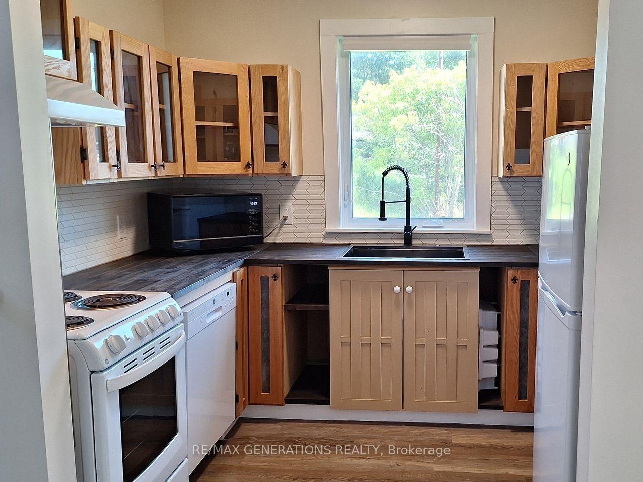 Photo 2 of 15 Ross Avenue, Marathon, TB-74 — HOMEH