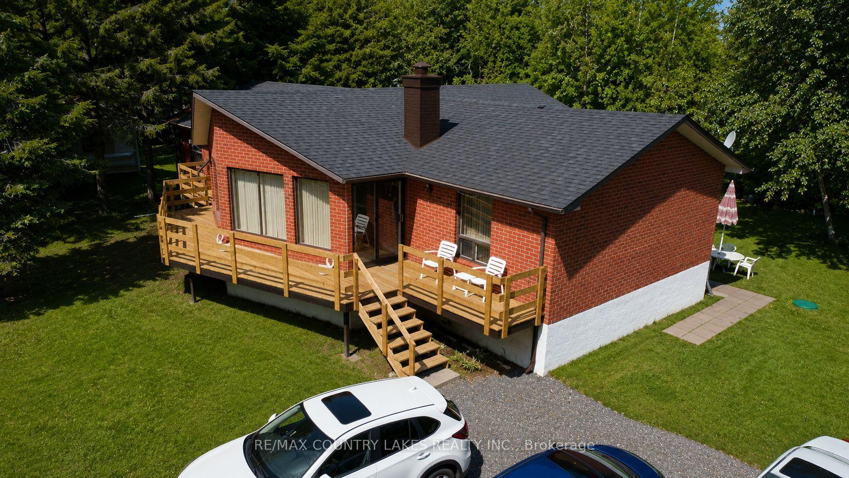 Photo 2 of 4 Macpherson Crescent, Kawartha Lakes, Carden — HOMEH