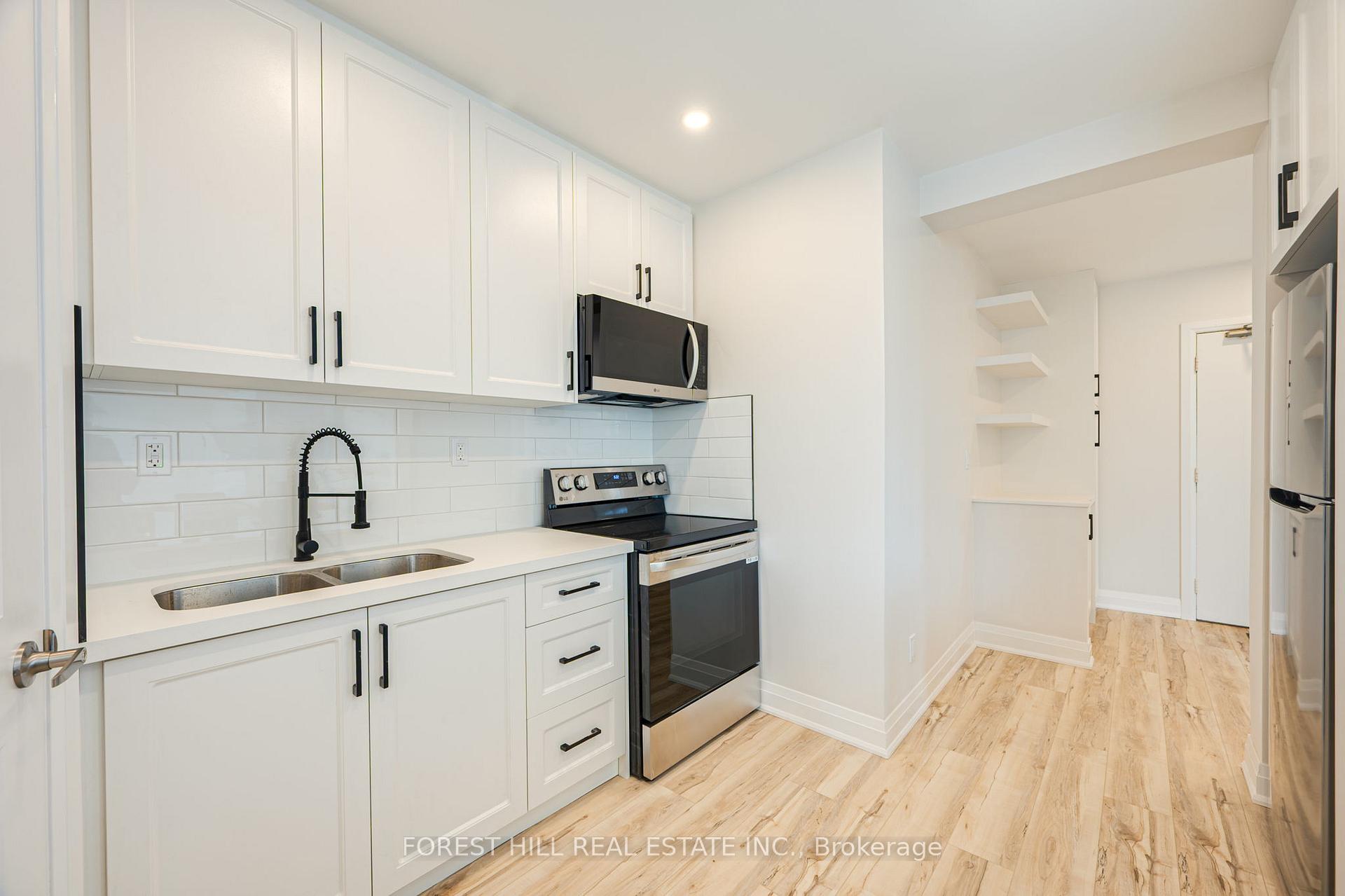 Photo 9 of Unit 2, 7725 Yonge Street, Markham, Thornhill — HOMEH