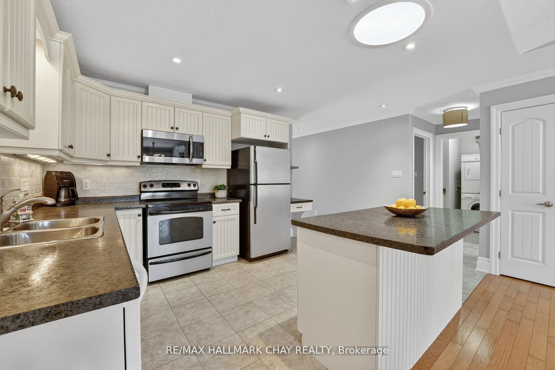 Photo 7 of 19 Greenway Drive, Wasaga Beach — HOMEH