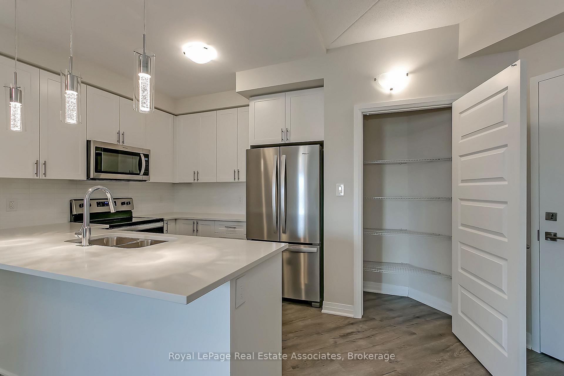 Photo 12 of Unit 524, 610 Farmstead Drive, Milton, Willmott — HOMEH