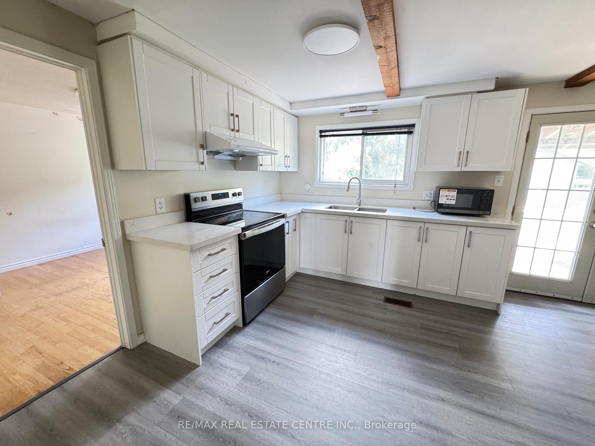 Photo 3 of 129 Kortright Road W, Guelph, Kortright West — HOMEH