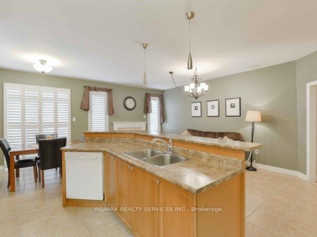 Photo 10 of 106 Pennyroyal Crescent, Brampton, Bramalea North Industrial — HOMEH
