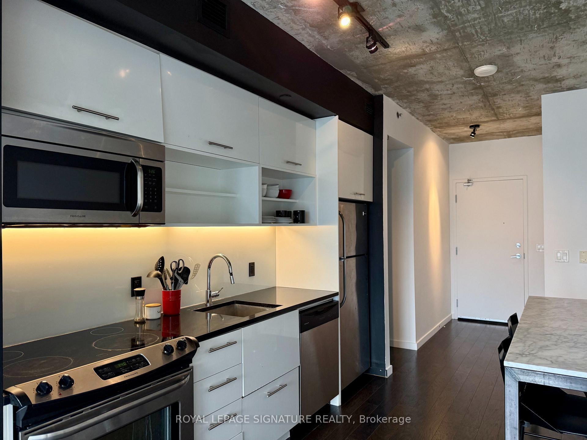 Photo 6 of Unit 1402, 51 Trolley Crescent, Toronto, Moss Park — HOMEH