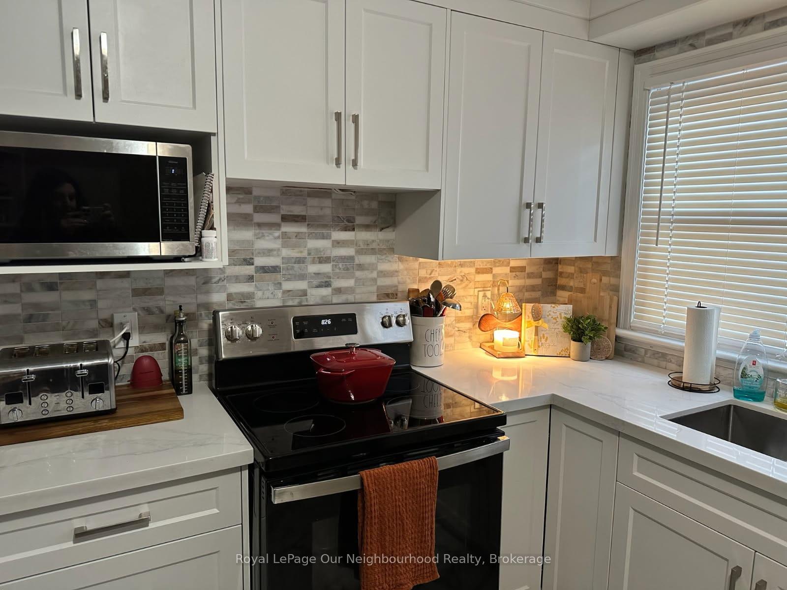 Photo 4 of Unit 2, 855 Simcoe Street N, Oshawa, Centennial — HOMEH