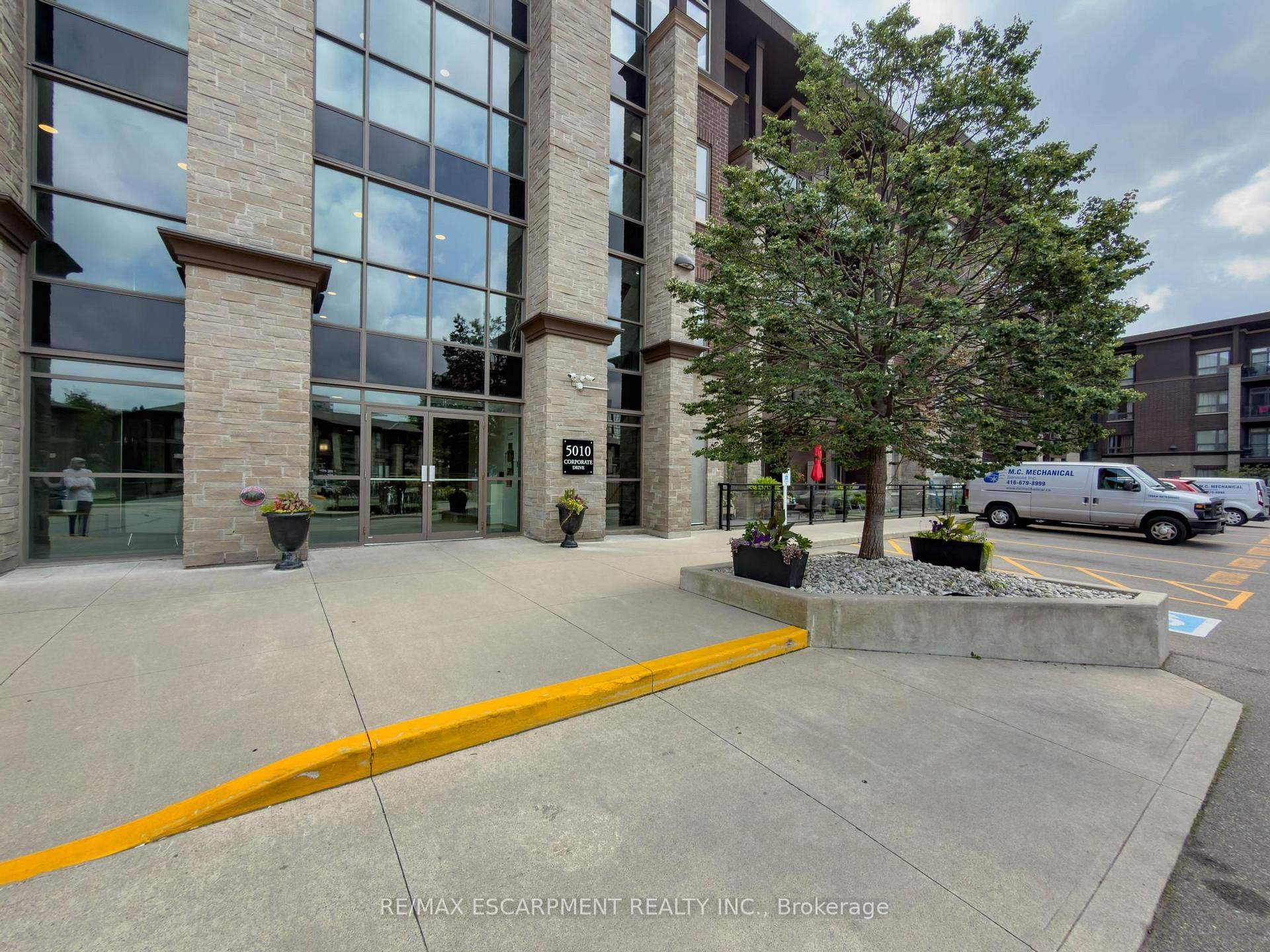 Photo 3 of Unit 109, 5010 Corporate Drive, Burlington, Uptown — HOMEH