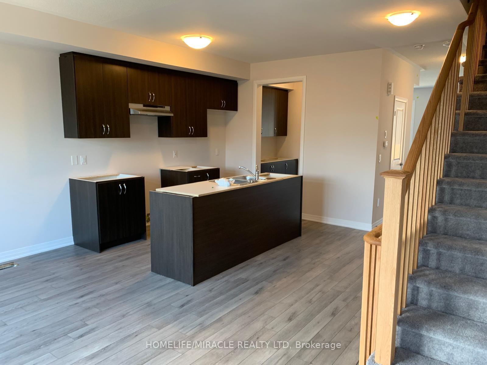 Photo 11 of Unit 109, 585 Colborne Street E, Brantford, East Ward — HOMEH