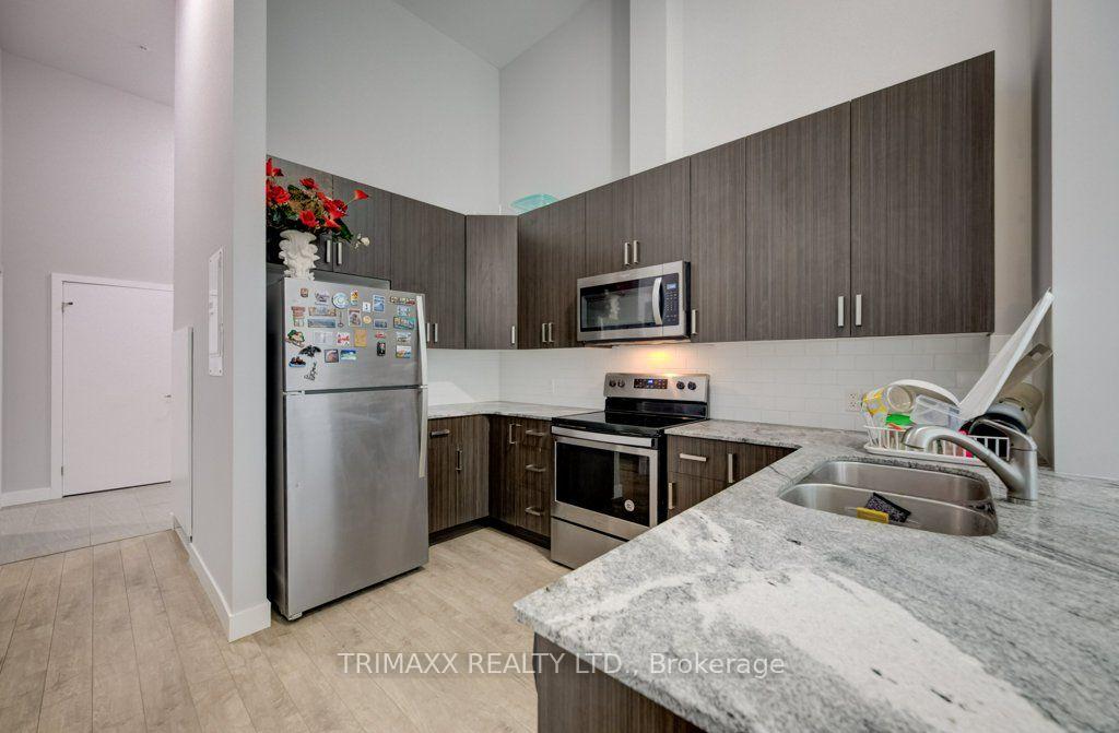 Photo 21 of 100 Garment Street, Kitchener, City Commercial Core — HOMEH