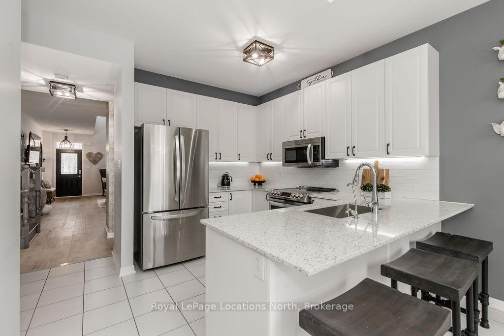 Photo 12 of 14 Berkshire Avenue, Wasaga Beach — HOMEH