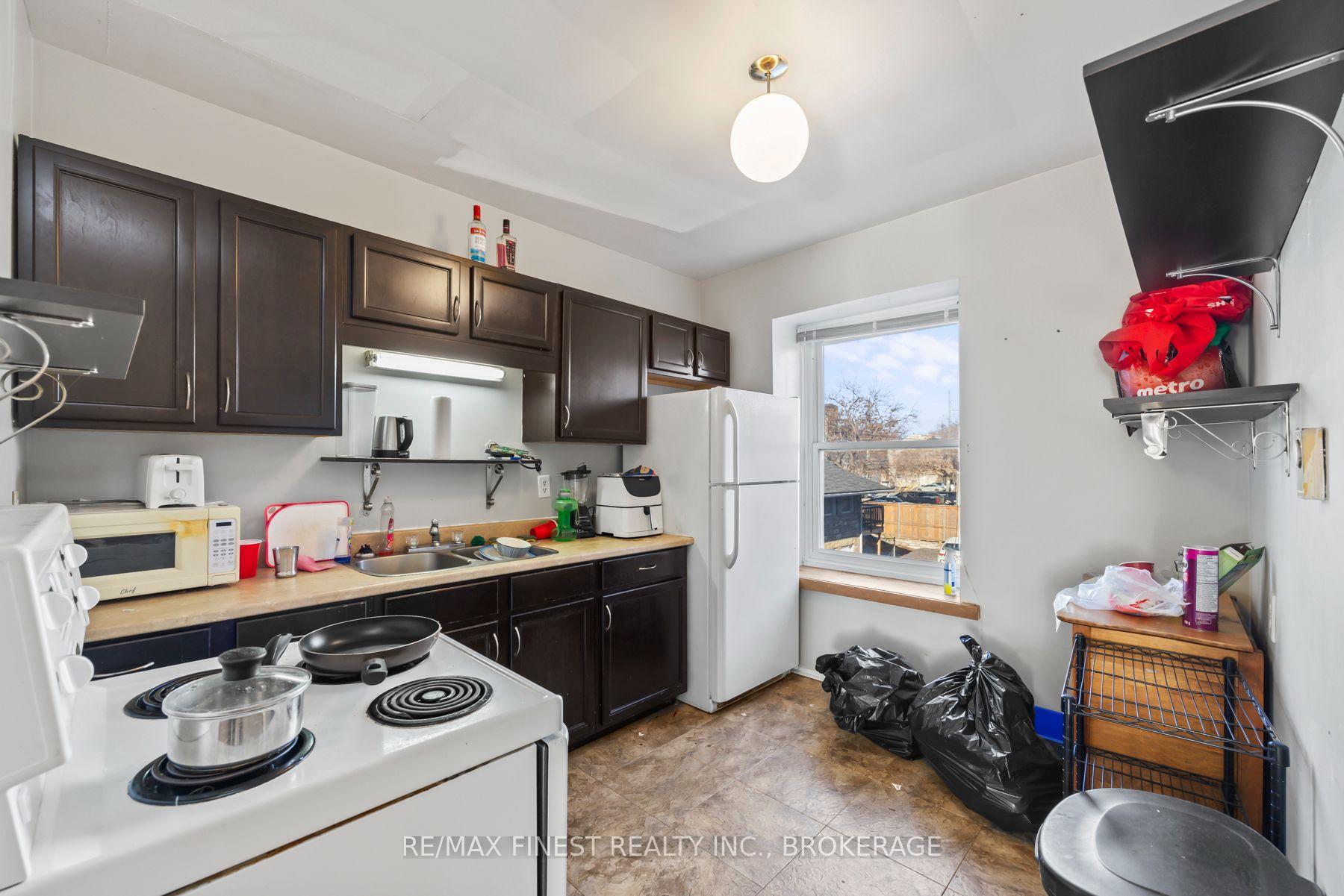 Photo 6 of 79-81A Queen Street, Kingston, East of Sir John A. Blvd — HOMEH