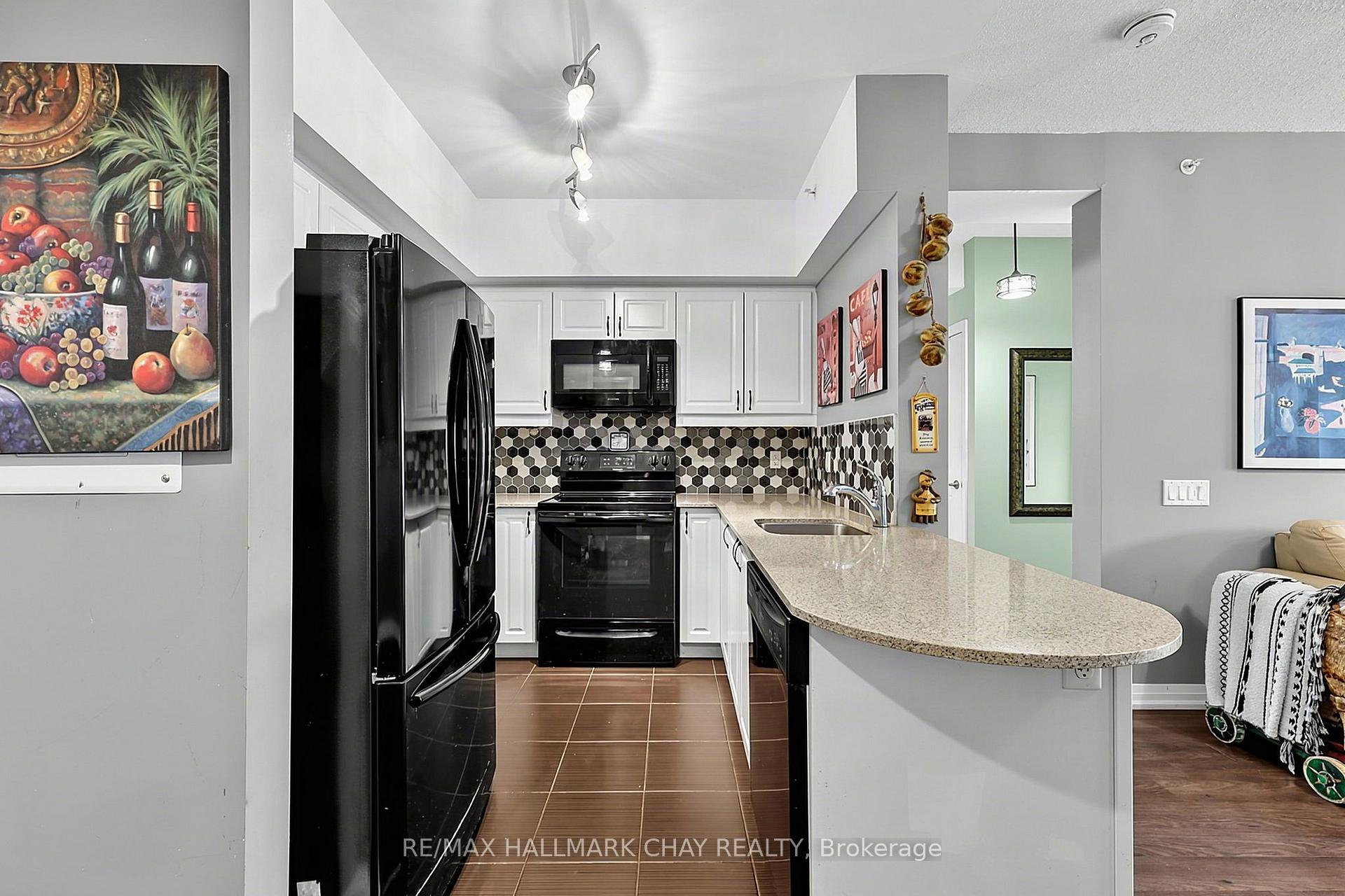 Photo 6 of Unit #304, 300 Essa Road, Barrie, 400 West — HOMEH