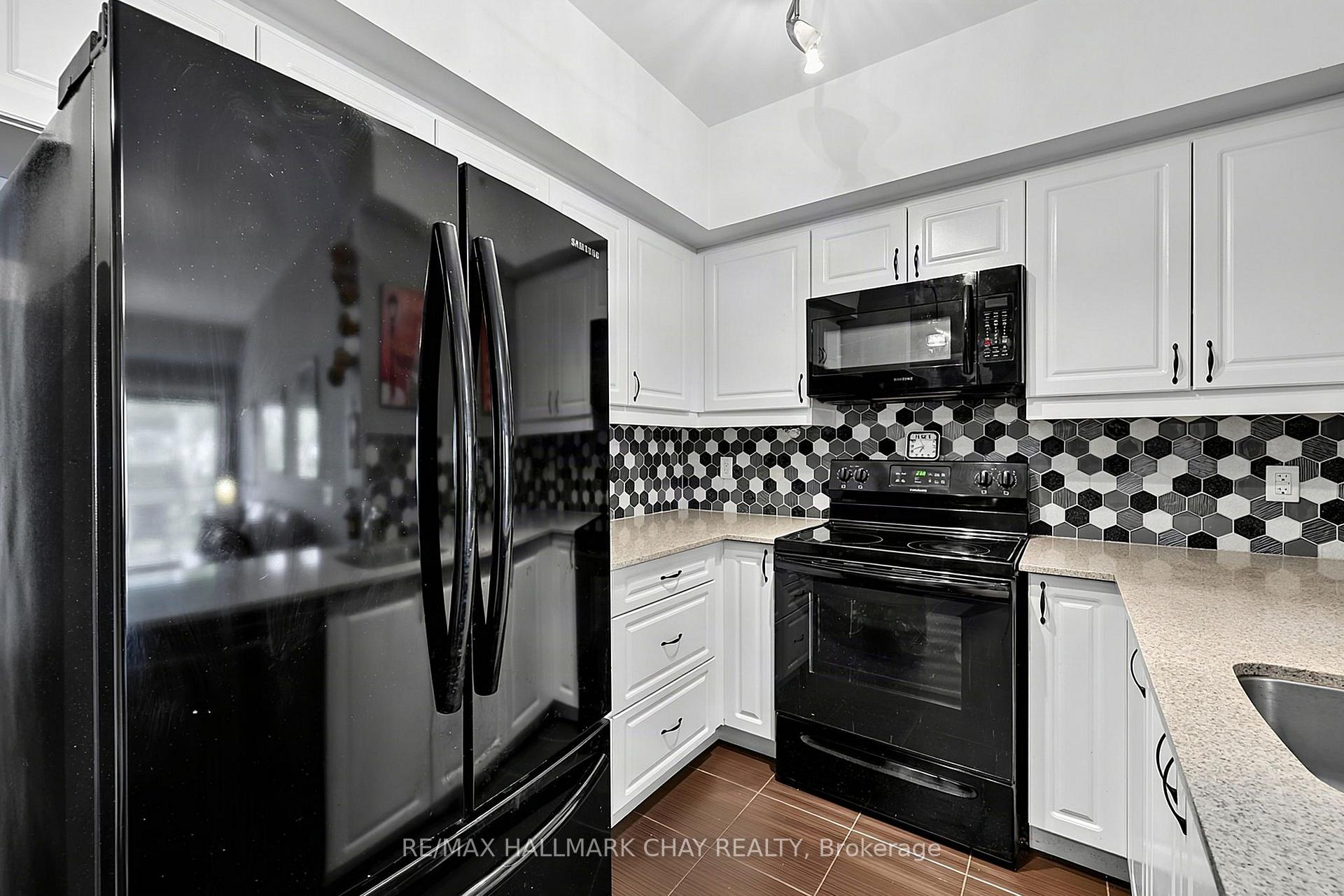 Photo 7 of Unit #304, 300 Essa Road, Barrie, 400 West — HOMEH