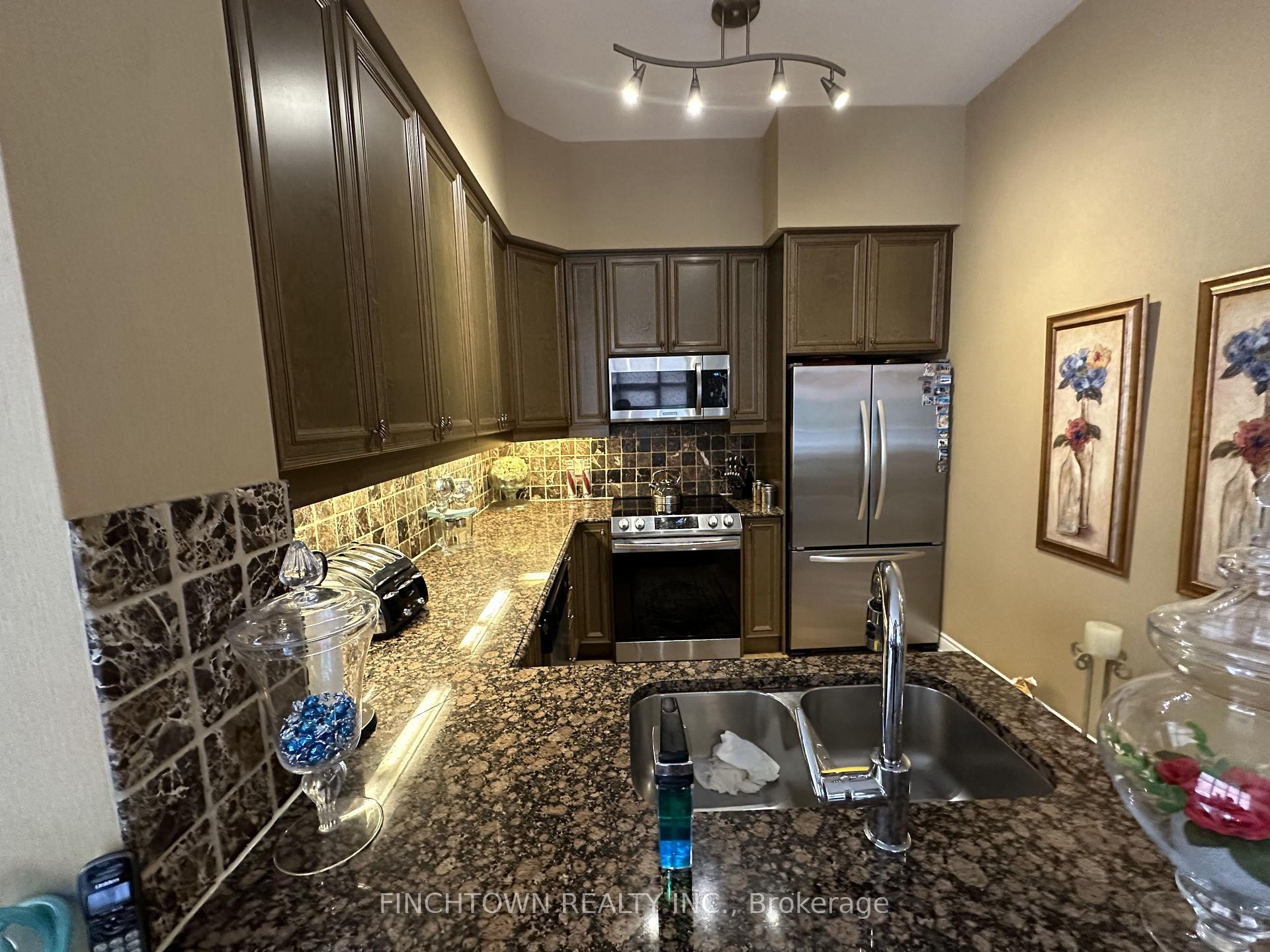 Photo 19 of Unit 111, 9235 Jane Street, Vaughan, Maple — HOMEH