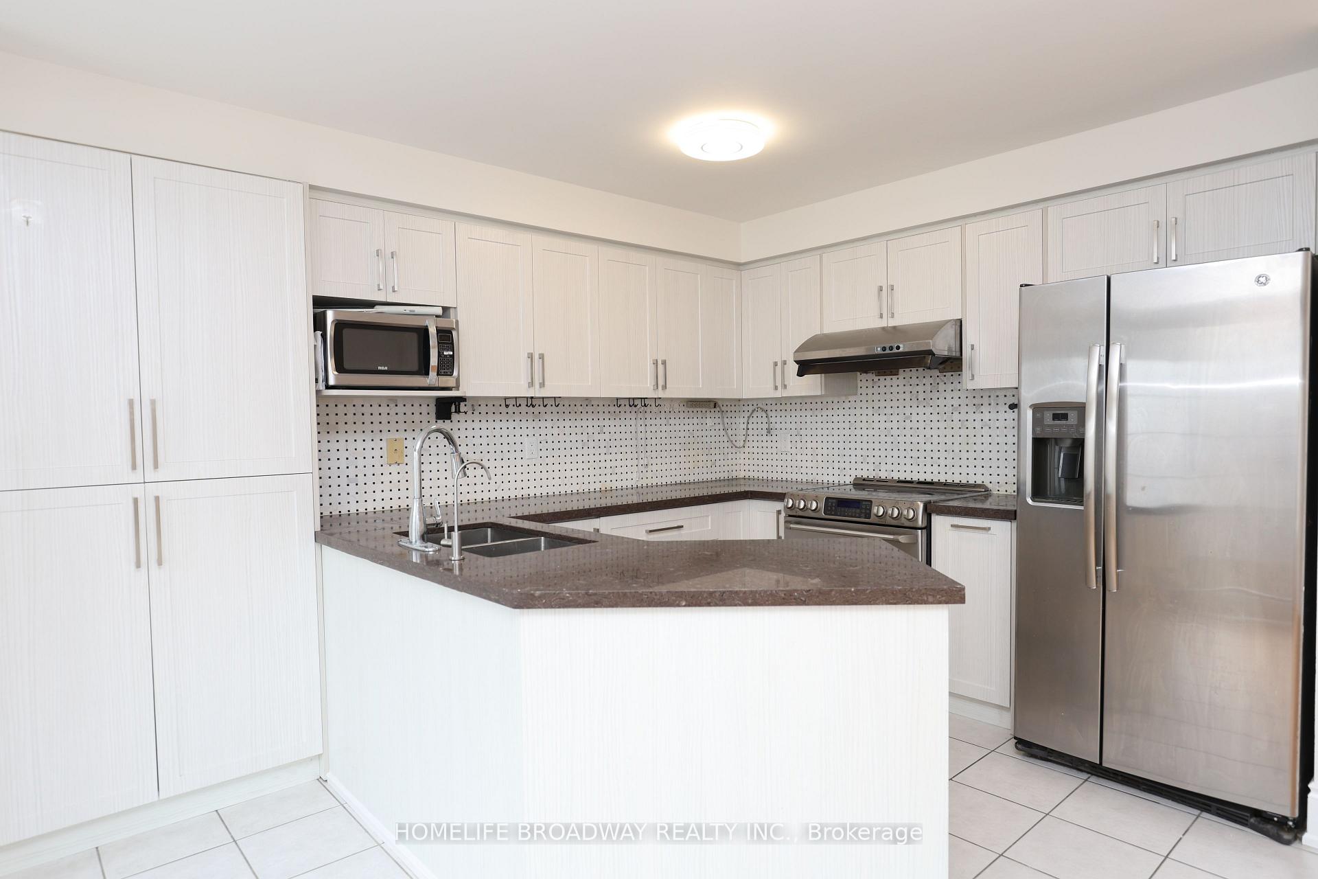 Photo 3 of 775 Bur Oak Avenue, Markham, Wismer — HOMEH