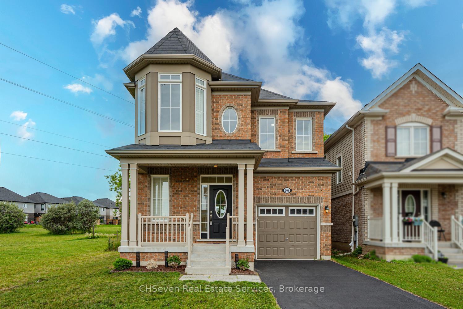 Photo 2 of 669 Doon South Drive, Kitchener, Doon South — HOMEH