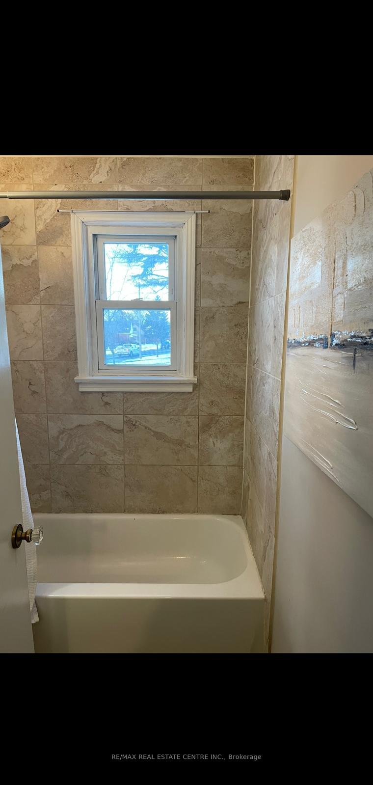 Photo 13 of Unit Upper, 41 Belleview Avenue E, Kitchener, Auditorium — HOMEH
