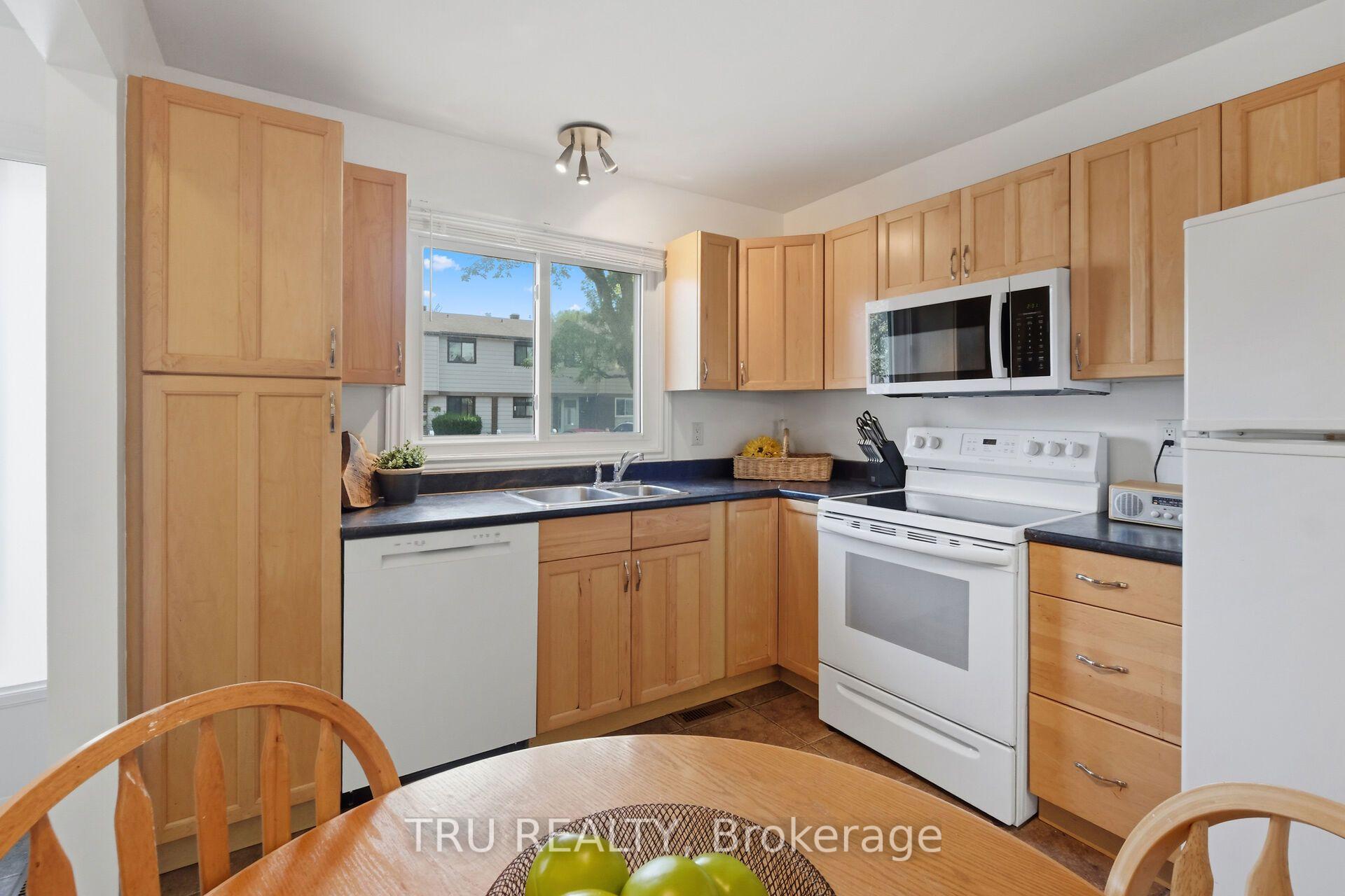 Photo 5 of Unit 59, 1999 Falkirk Crescent, Ottawa, Blackburn Hamlet (South) — HOMEH