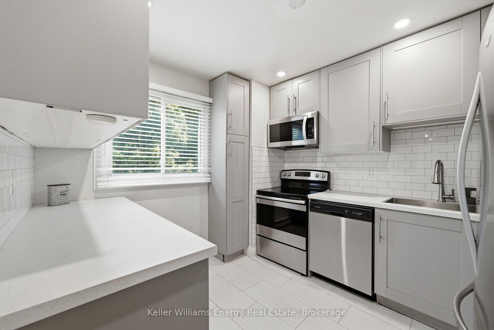 Photo 5 of Unit 105, 700 Harmony Road N, Oshawa, Pinecrest — HOMEH