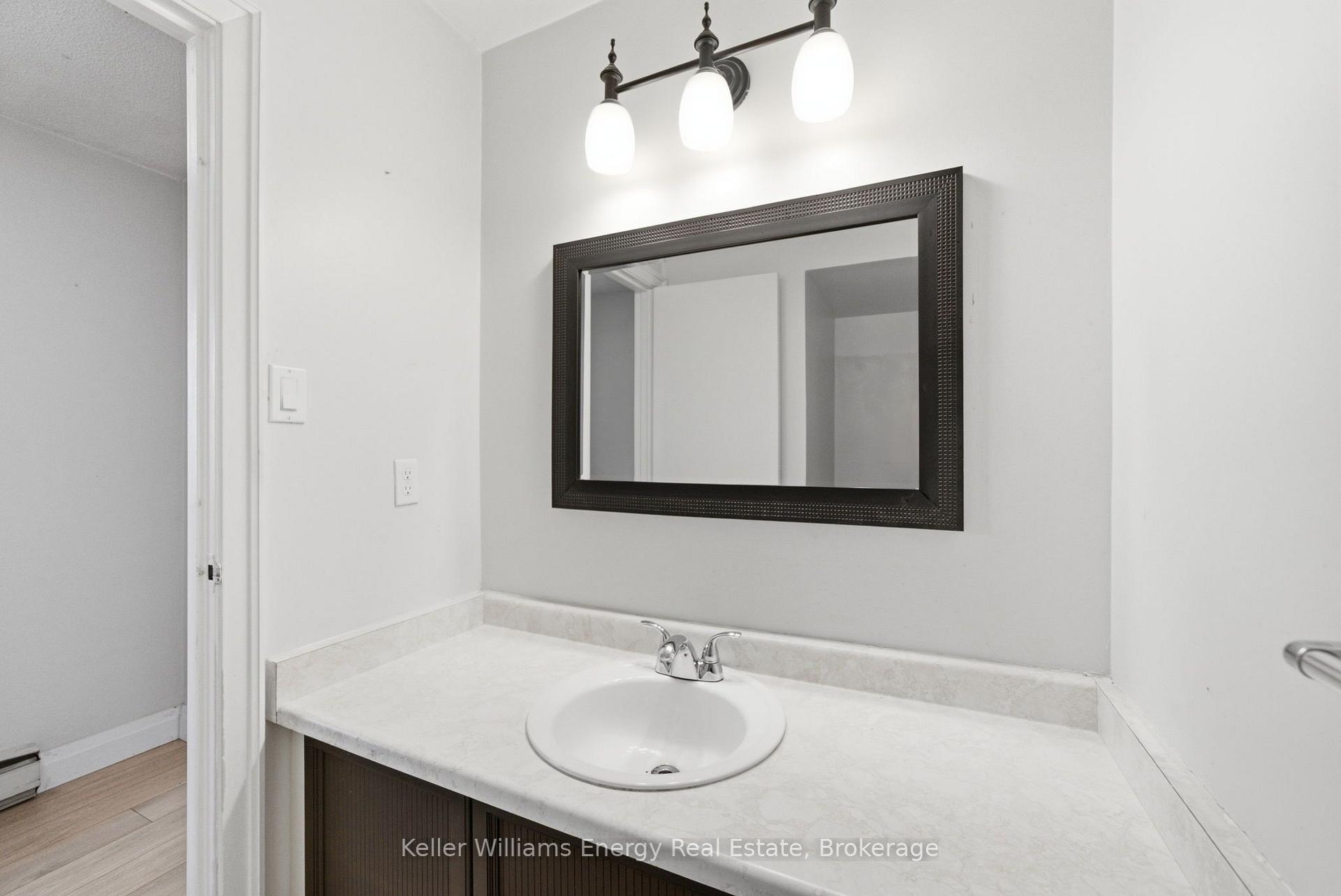 Photo 17 of Unit 105, 700 Harmony Road N, Oshawa, Pinecrest — HOMEH