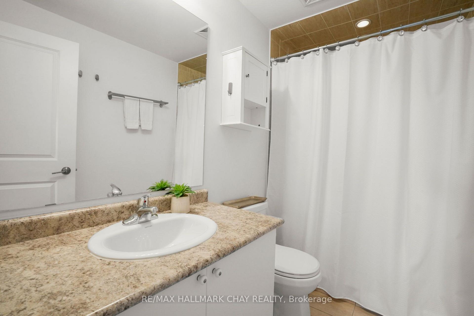 Photo 15 of Unit 404, 157 Wellington Street E, New Tecumseth, Alliston — HOMEH