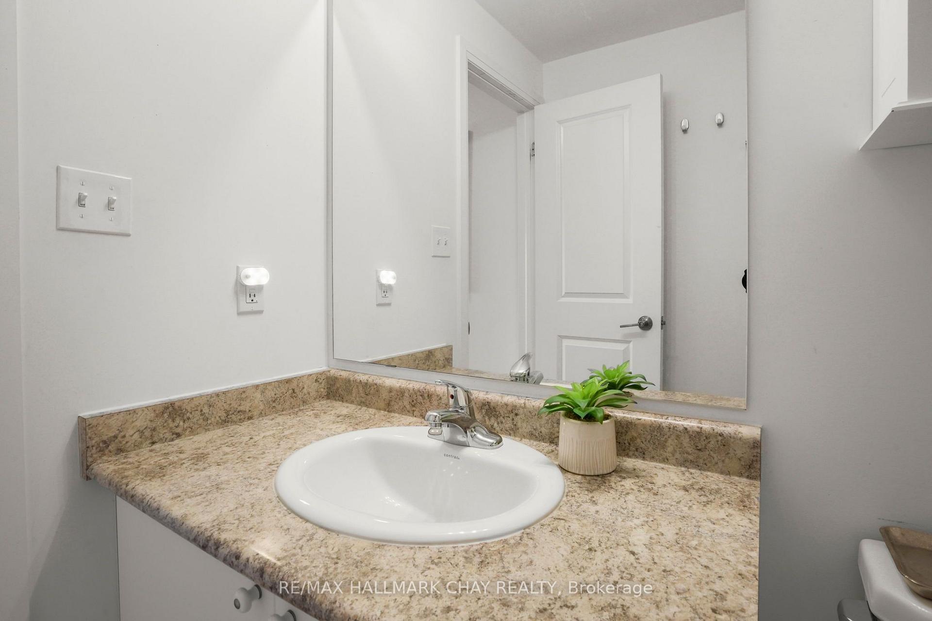 Photo 16 of Unit 404, 157 Wellington Street E, New Tecumseth, Alliston — HOMEH