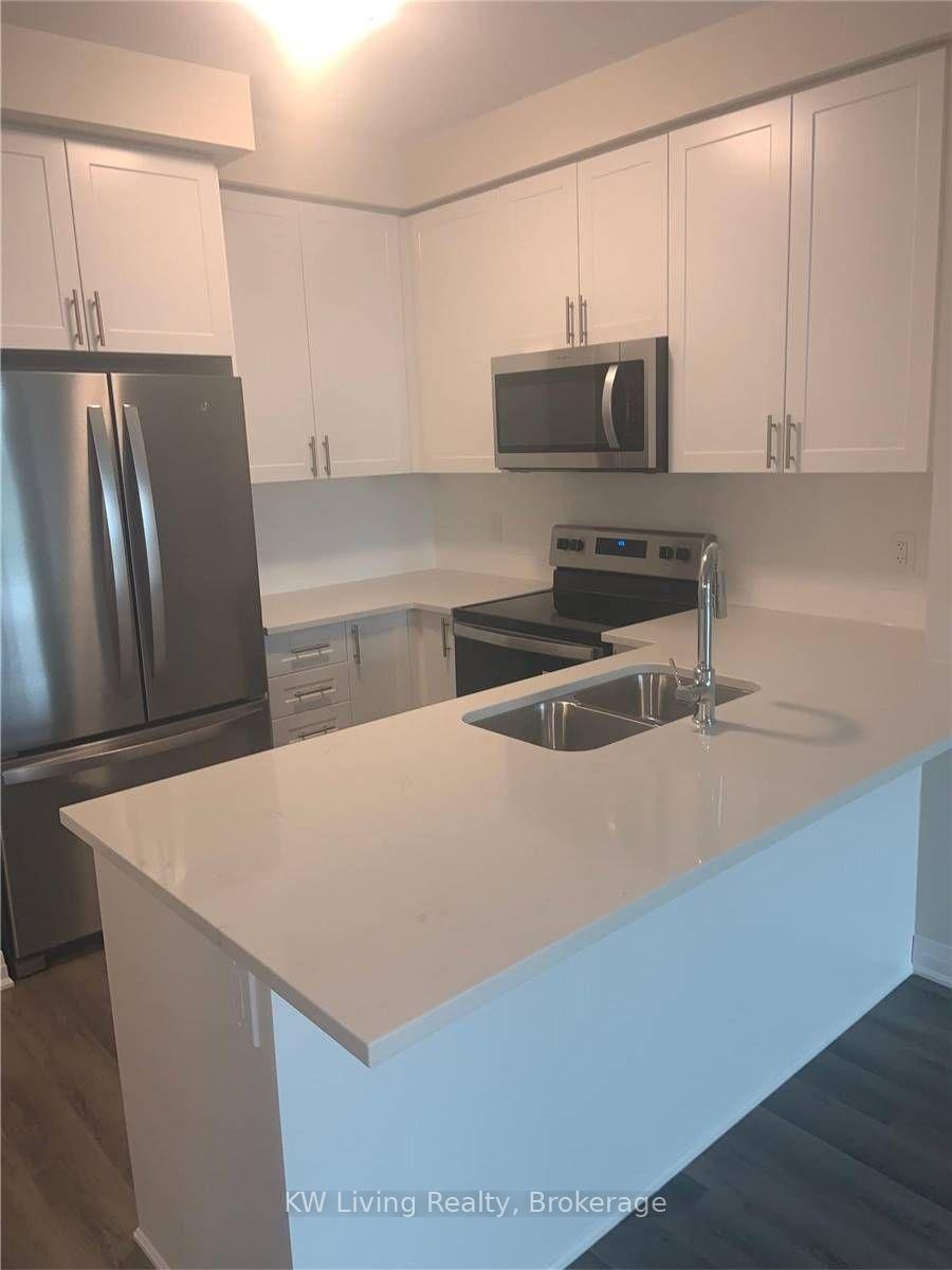 Photo 6 of Unit 613, 610 Farmstead Drive, Milton, Willmott — HOMEH