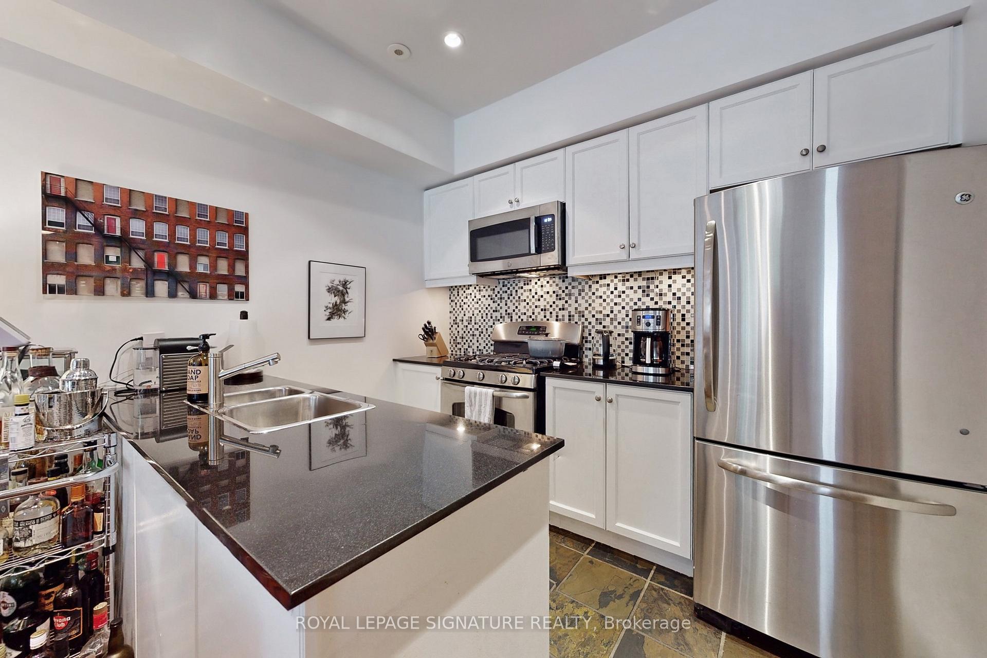 Photo 4 of Unit 42, 6 Wellesley Place, Toronto, North St. James Town — HOMEH