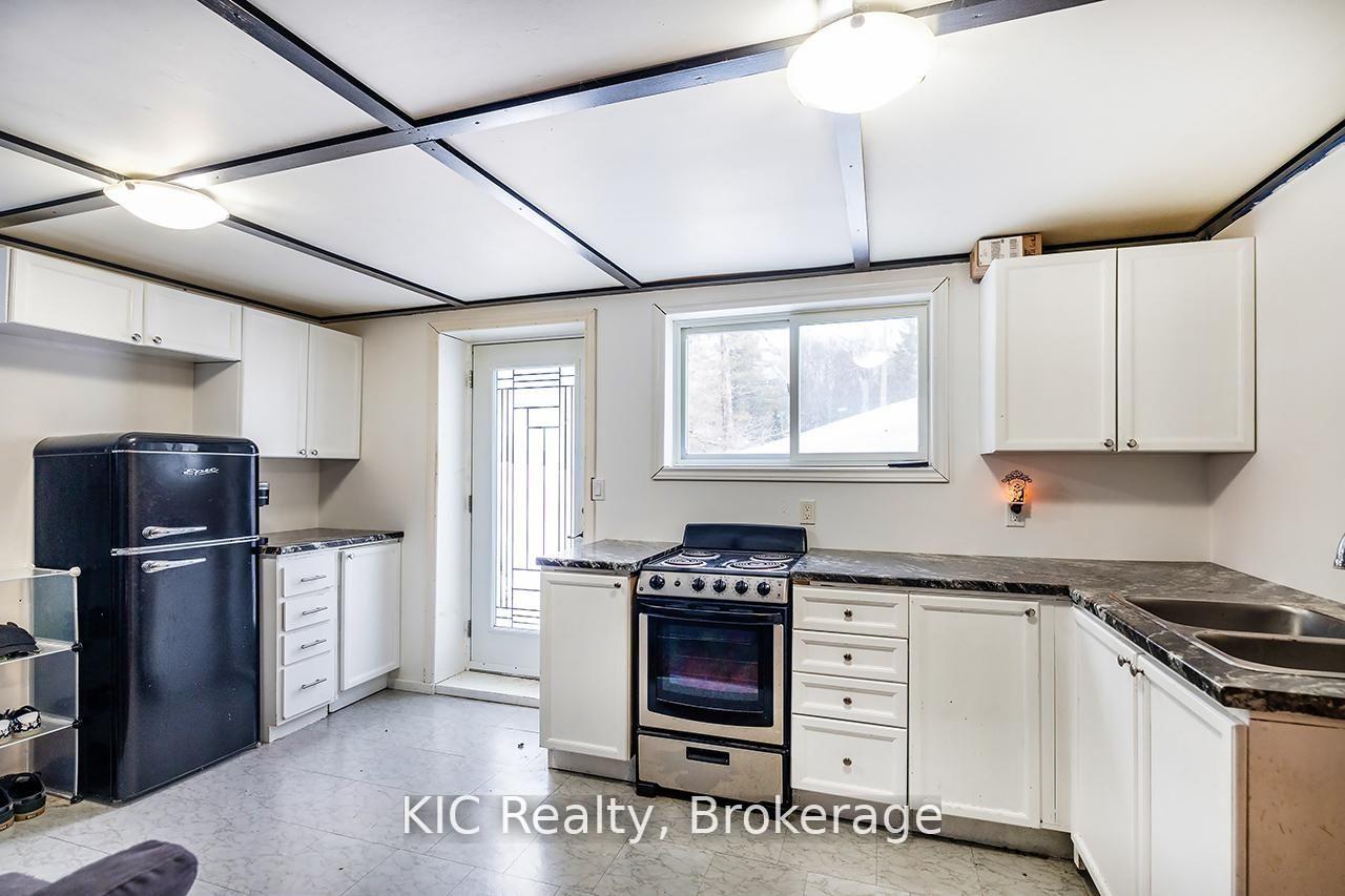 Photo 11 of Unit Lower, 14202 Highway 118 E, Dysart et al, Dysart — HOMEH