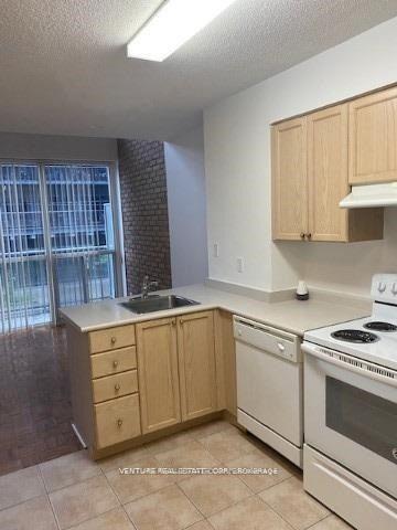 Photo 7 of Unit 209, 1029 King Street W, Toronto, Niagara — HOMEH