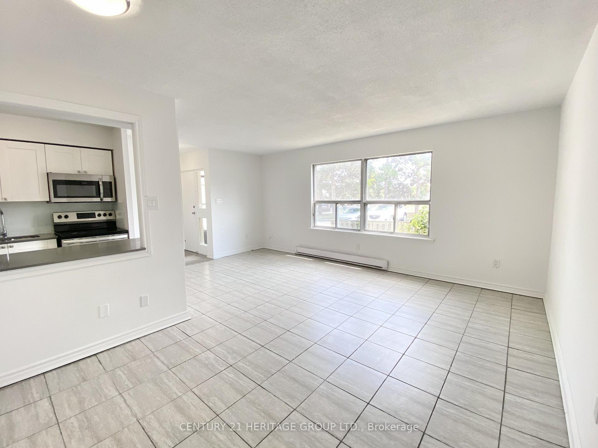 Photo 3 of Unit 5, 7555 Goreway Drive, Mississauga, Malton — HOMEH