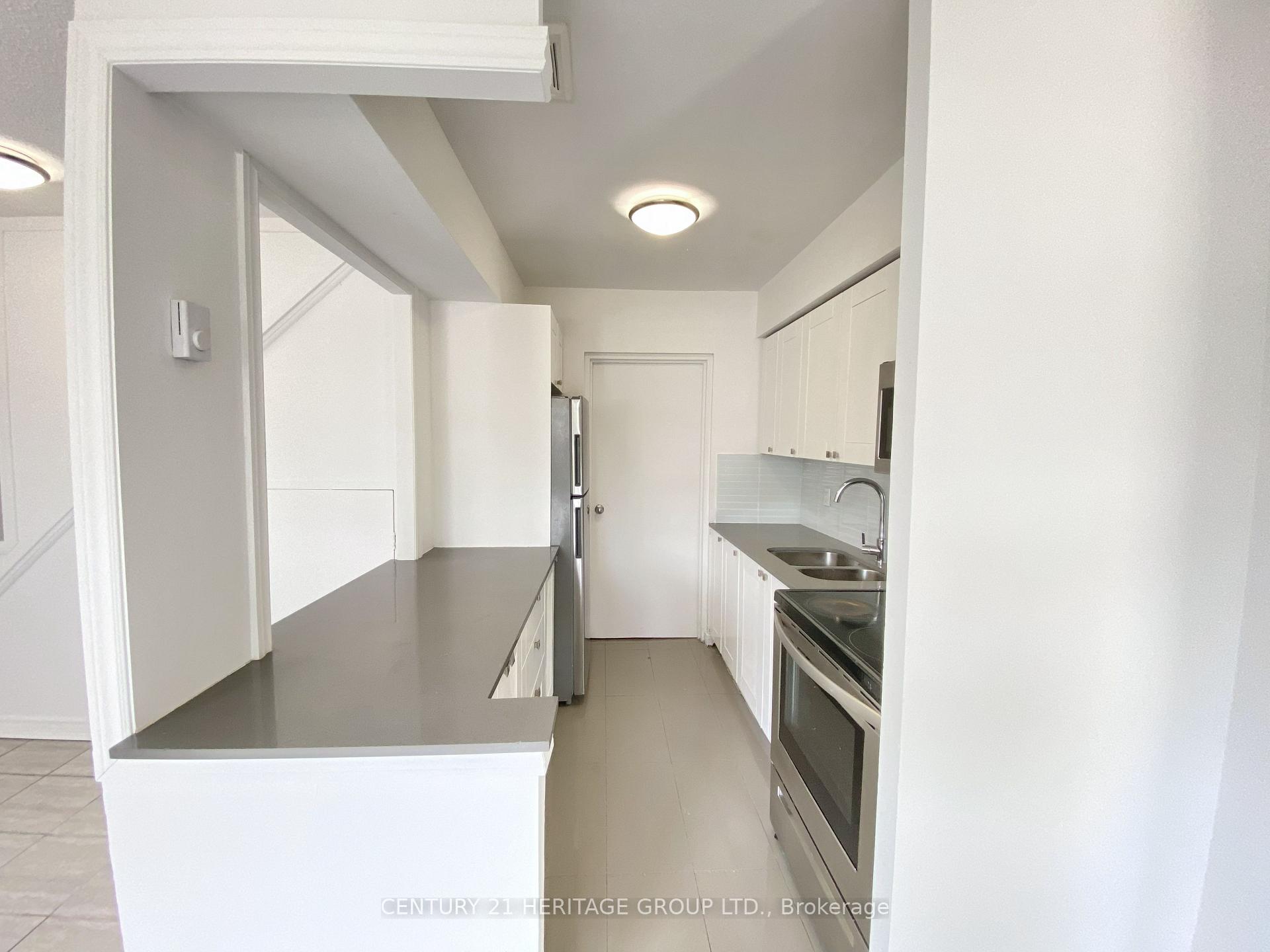 Photo 5 of Unit 5, 7555 Goreway Drive, Mississauga, Malton — HOMEH