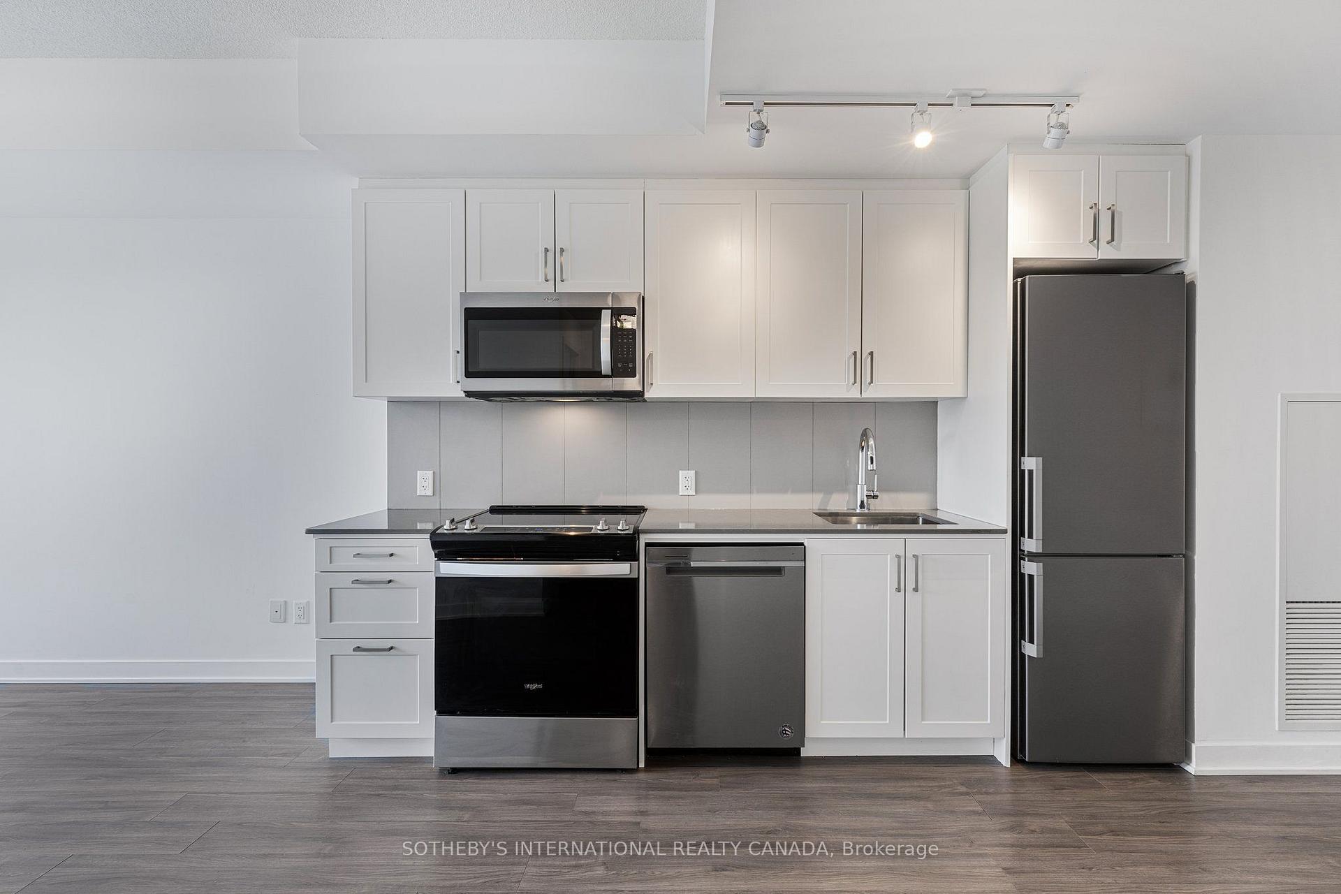 Photo 4 of Unit 403, 681 Yonge Street, Barrie, Painswick South — HOMEH