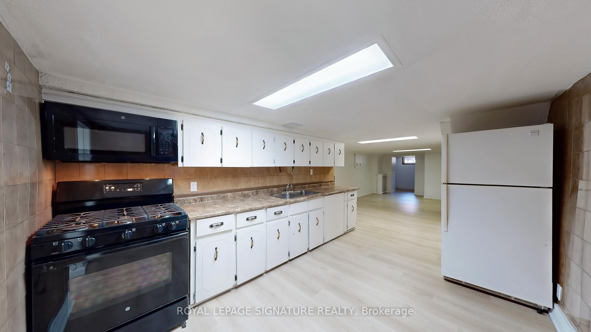 Photo 4 of Unit Lower, 247 Palmerston Avenue, Toronto, Trinity-Bellwoods — HOMEH