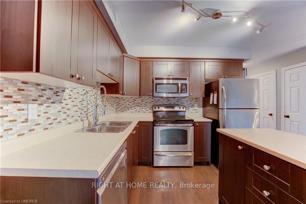 Photo 7 of Unit 60, 20 Mcconkey Crescent, Brantford, East Ward — HOMEH