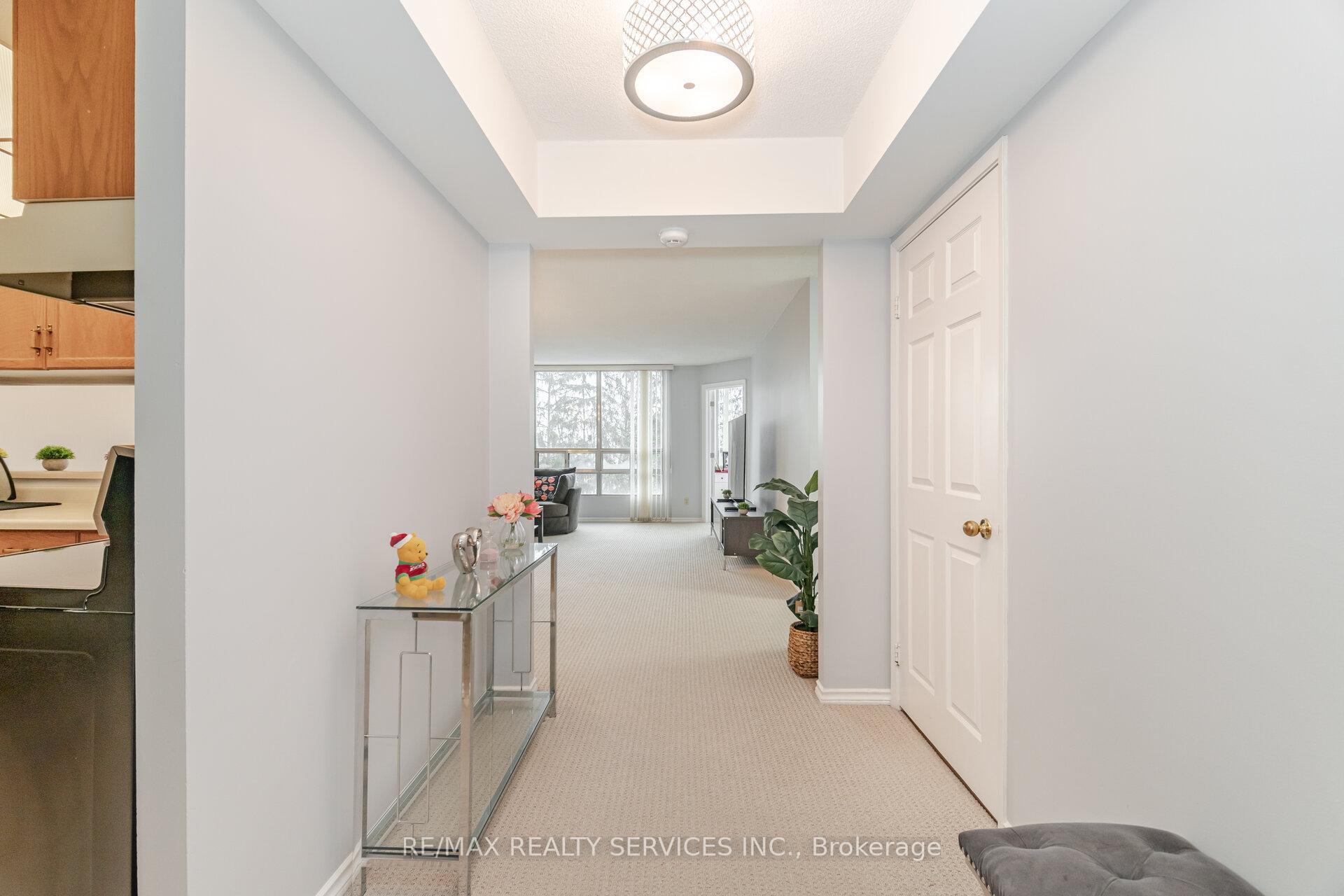 Photo 8 of Unit 402, 330 Mill Street S, Brampton, Brampton South — HOMEH