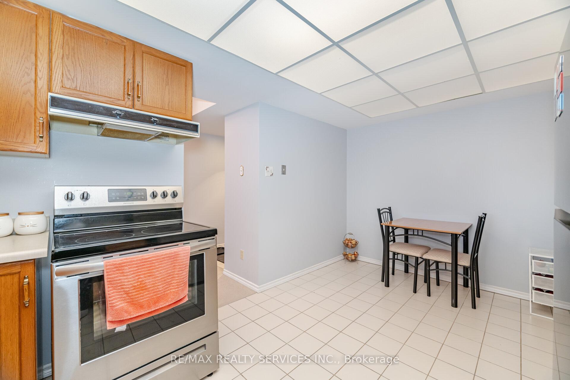 Photo 9 of Unit 402, 330 Mill Street S, Brampton, Brampton South — HOMEH