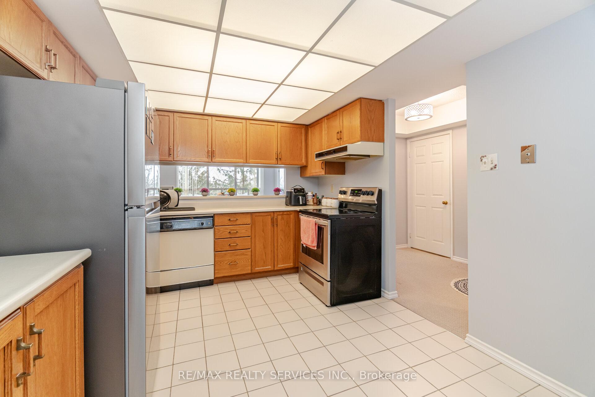 Photo 14 of Unit 402, 330 Mill Street S, Brampton, Brampton South — HOMEH