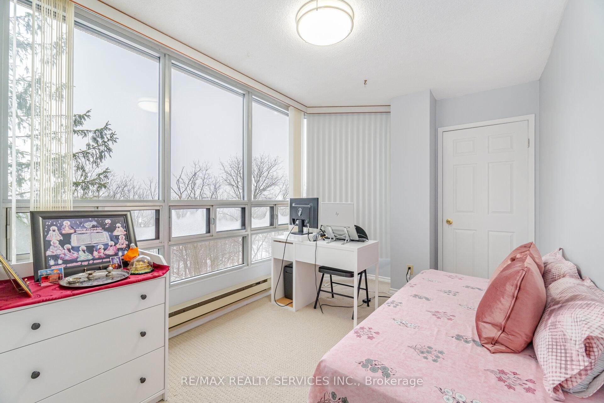 Photo 35 of Unit 402, 330 Mill Street S, Brampton, Brampton South — HOMEH